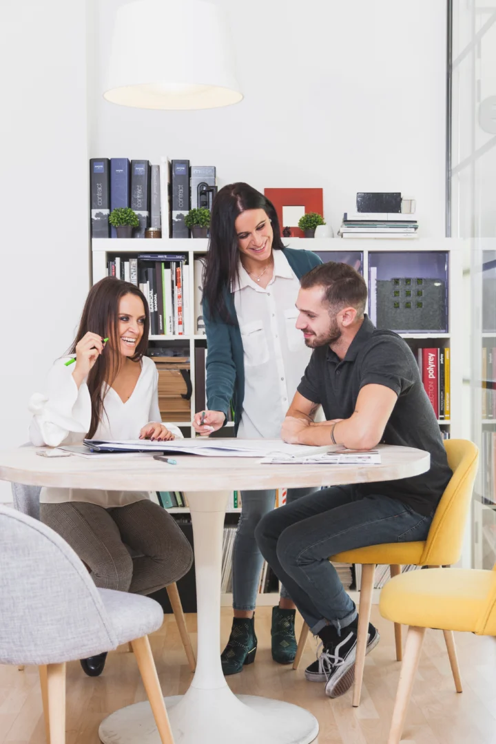 https://agrimadvisors.com/wp-content/uploads/2026/04/cheerful-coworkers-desk-office-720x1080.webp